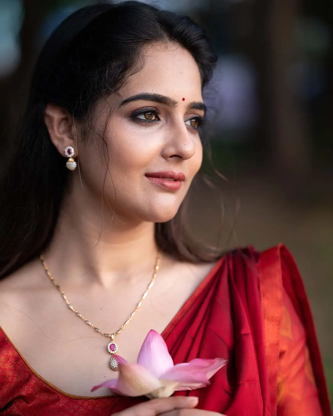 Malvi Malhotra Stills in Orange Lehenga Red Choli Maroon Voni